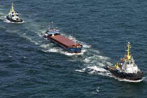 The Janina under tow by Multraship tugs, July 2010 (Photo credit: Sky Pictures)