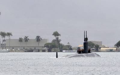 The Los Angeles-class fast attack submarine USS Santa Fe (SSN 763) departs Joint Base Pearl Harbor-Hickam for a deployment to the western Pacific. (U.S Navy photo by Mass Communication Specialist 2nd Class Steven Khor/Released)