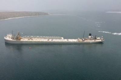 The motor vessel Mississagi sits aground in the lower St. Marys River near De Tour Village, Mich., April 22, 2015. (U.S. Coast Guard photo courtesy of Coast Guard Air Station Traverse City)