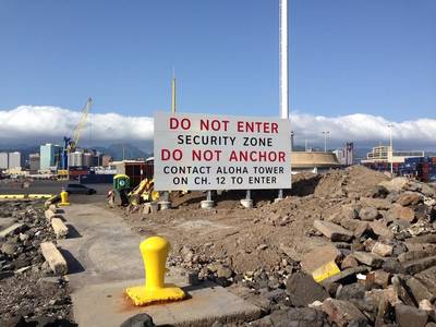 The new sign in Honolulu Harbor will inform mariners of the 24/7 security zone in the harbor and whom to contact for permission to enter. (U.S. Coast Guard photo)