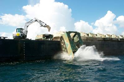 The South Carolina Army National Guard and the South Carolina Department of Natural Resources turns unused armored carrier vehicles into an artificial reef off the coast of Beaufort, S.C. in 2014. (Courtesy photo by Phillip Jones/South Carolina Army National Guard)