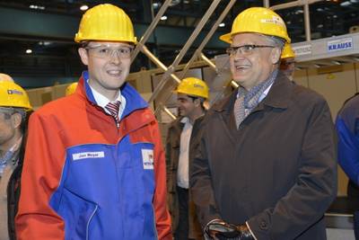 The steel cutting took place at the Meyer Werft shipyard in Papenburg, Germany, where the two ships will be built. Pictured here are (from left to right) Jan Meyer, Managing Partner, Meyer Werft and Harri Kulovaara, EVP, Newbuild and Design, Royal Caribbean International.
