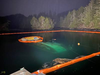 The submerged 52-foot fishing vessel, Haida Lady, surrounded by boom, February 26, 2021. Coast Guard Sector Juneau personnel received a report that the vessel sank. - U.S. Coast Guard photo by MSD Sitka personnel (Photo: Alexandria Preston / U.S. Coast Guard)