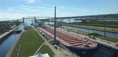 The surge in water levels on Lake Superior and across the Great Lakes are a boon to this freighter travelling through the Soo Locks in June. (Photo: NOAA)