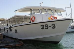 The third USS Arizona Memorial ferry boat #39-3, Cassin Young, a bio-diesel boat, operating at Naval Station Pearl Harbor. The third boat is named after Capt. Cassin Young, a Medal of Honor recipient for heroism and distinguished conduct in action while serving as commanding officer of USS Vestal (AR-4) during the Dec. 7, 1941 Japanese attack on Pearl Harbor. (U.S. Navy photo by Mass Communication Specialist 2nd Class Mark Logico/Released)