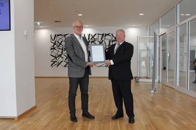 The Type Approval certificate is presented to Dr. Martin Schmitz-Niederau, voestalpine Böhler Welding Germany GmbH (left) by Norbert Worm Principal Welding Engineer, Materials &amp; Welding at DNV. (Photo: DNV)