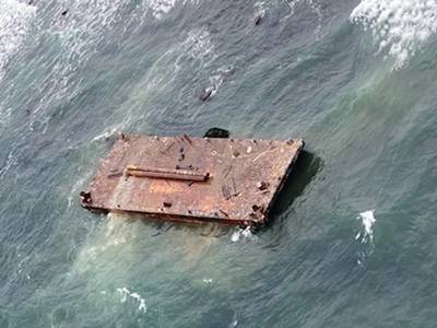 The U.S. Coast Guard rescued three mariners from a disabled 108-foot barge off Point Judith, R.I., November 25, 2020. (Photo: U.S. Coast Guard)