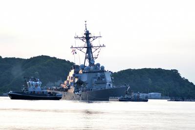 The U.S. Navy Arleigh Burke-class guided-missile destroyer USS Fitzgerald (DDG 62) returns to Fleet Activities Yokosuka following a collision with a merchant vessel while operating southwest of Yokosuka, Japan, June 17, 2017. (U.S. Navy photo by Peter Burghart)