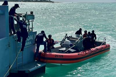 The USCGC Oliver Henry (WPC 1140) crew pick up Kiribati Police Maritime Unit officers and recruits from the Guardian-class patrol boat RKS Teanoai II (301) in Tarawa, Kiribati, on Feb. 16, 2024, during an exchange. (Photo: Nicholas Haas / U.S Coast Guard)