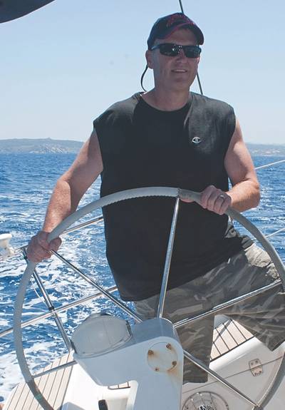 “Throwback Thursday” from the Maritime Reporter archives: Greg at the wheel on a sailing excursion off the coasts of Italy and France in August 2011