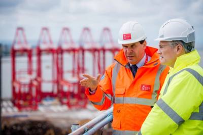 Transport Minister Andrew Jones (right) with Warren Marshall, Group Planning Director at Peel Ports, overlooking the port (Photo: Peel Ports Group)