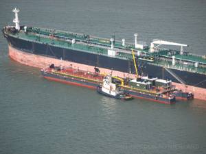 Tug Vivian L. Roehrig watches-over DBL 23, one of the company's new 28,000 BBL JAK-equipped barges. K-Sea has acquired two new tugs so far this year, but still calls-in independents when things get busy. (Photo: Don Sutherland.)