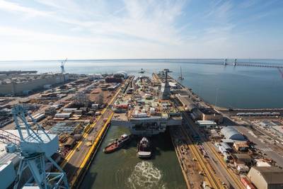 Tugboats move the aircraft carrier John F. Kennedy (CVN 79) from Newport News Shipbuilding’s Dock Dry 12 to Pier 3, where the ship will undergo final completion and outfitting before planned delivery to the U.S. Navy in 2022. (Photo: Matt Hildreth/HII)