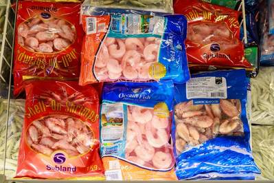 Turbulence stirred by President Donald Trump’s tariffs could disrupt global shrimp shipments to the United States, with exporters in top supplier India warning that up to 2,000 containers of frozen shrimp are at risk. Credit: Adobe Stock/Iurii Gagarin