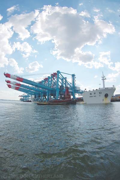 With the Joan Turecamo on the bow and the Laura K.Moran at the stern, Zhen Hua 10 with four gantry cranes eases-in the final few hundred feet to Port Elizabeth. (Photo: Don Sutherland)