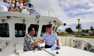 USCG Forces Micronesia Sector Guam Commander Capt. Nicholas R. Simmons and Joses R. Gallen, Secretary of Justice, Federated States of Micronesia, signed an expanded shiprider agreement aboard the USCGC Myrtle Hazard (WPC 1139) in Guam, on Oct. 13, 2022. (Photo: Sara Muir / U.S. Coast Guard)