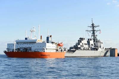 USS Fitzgerald is loaded onto heavy lift transport MV Transshelf for transport to Pascagoula, Miss. to complete repairs. (U.S. Navy photo by William McCann)