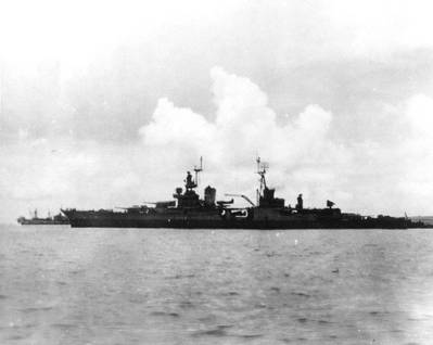 USS Indianapolis (CA-35) preparing to leave Tinian after delivering atomic bomb components, circa July 26, 1945. She was sunk on July 30 while en route to the Philippines. (Donation of Major Harley G. Toomey, Jr., USAF(Retired), 1971, who took this photograph. U.S. Naval Historical Center Photograph)