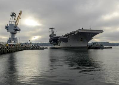 USS Nimitz arrives pierside at Naval Base Kitsap Bremerton for a planned incremental availability at Puget Sound Naval Shipyard and Intermediate Maintenance Facility where the ship will receive scheduled maintenance and upgrades. (U.S. Navy photo by Ryan J. Mayes)