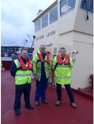 Wearing the new K2- 275 twin chamber lifejackets (left-right): Andy Bracewell –  Sales Manager, Mr Robert Gray – Managing Director at Southampton Marine Services , Andy Norwood – Health and Safety Officer, Svitzer, UK