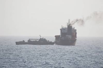 Wila, a merchant vessel in international waters en-route to the UAE port of Khor Fakkan, in the Gulf of Oman, was boarded by armed Iranian personnel from both an Iranian Sea King helicopter and the Iranian auxiliary vessel Hendijan (1401). (U.S. Navy photo)