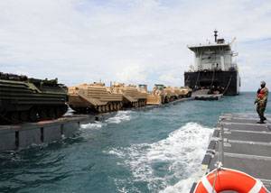  Military Sealift Command Maritime Prepositioning Ship USNS 1st Lt. Baldomero Lopez conducts an at-sea offload of Marine Corps cargo off the coast of Thailand May 2. The operation, which began April 28 and ended May 8, delivered cargo for the 3rd Marine Expeditionary Force, which will participate in Cobra Gold – an annual exercise designed to promote regional stability and security throughout Southeast Asia. A second MSC Maritime Prepositioning ship, USNS 1st Lt. Harry L. Martin, also participat