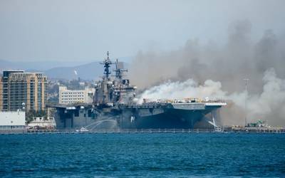 The USS Bonhomme Richard (LHD 6) burns while moored at Naval Base San Diego on July 12, 2020. Photo: John J. Mike / (U.S. Navy)