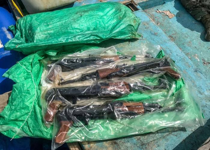 A bag of AK-47 automatic rifles seized from a skiff by the guided-missile destroyer USS Jason Dunham's (DDG 109) visit, board, search and seizure team while conducting maritime security operations. (U.S. Navy photo)