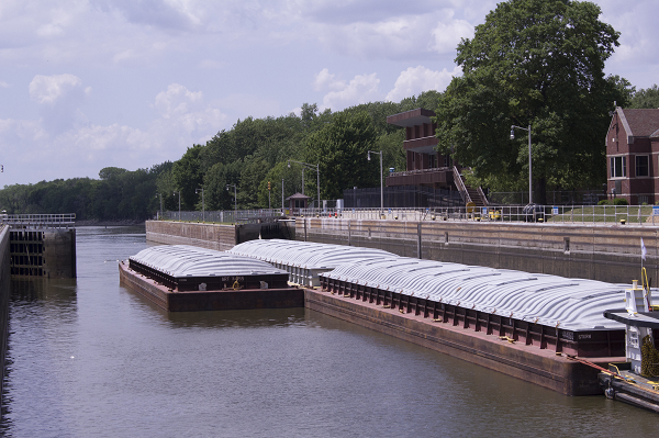 (A Barge at Starved Rock. An average of 16 million tons of soybeans move through locks on the Illinois Waterway each year. While much needed repairs are underway, Illinois farmers will need to navigate lock closures in 2019, 2020 and 2023.) CREDIT: Illinois Soybean Association