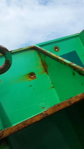 A buoy pierced with bullet holes, Monday, April 24, 2017, off the coast of Block Island. The buoy was found by the crew of Coast Guard Cutter Ida Lewis and the penalty for damaging or tampering with Federal Aids to Navigation is up to 20 years of imprisonment and as much as $2,500 fine per day for each violation. (U.S. Coast Guard photo by Patrick Morkis)