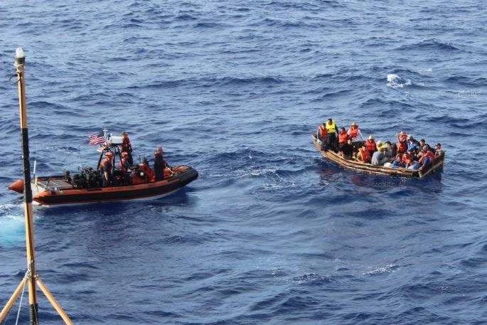A Coast Guard Cutter Dauntless smallboat crew interdicts 25 Cuban migrants aboard a rustic vessel southwest of Key West, Florida, Sep. 6, 2011. The migrants were later repatriated by the crew aboard the Coast Guard Cutter Knight Island. U.S. Coast Guard photo.