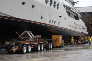 A skilled team of engineers from HMR Supplies designed the bolster and dolly systems used to move this 215-foot, 480-ton superyacht from its fabrication facility to open water.