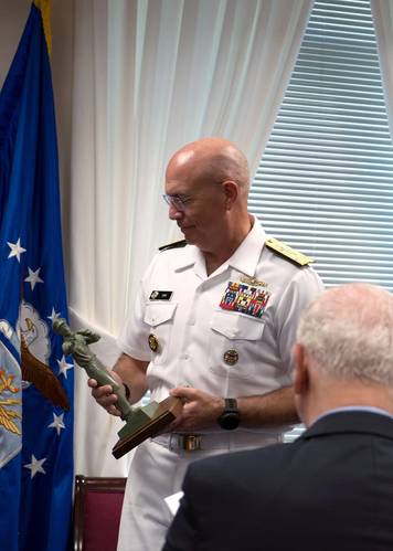 Vice Adm. Kurt Tidd accepts the "Old Salt" award during a ceremony at the Pentagon in Washington, D.C. Tidd is the 19th recipient of the "Old Salt" award, presented to the longest serving surface warfare officer on continuous active duty. (US Navy photo by Tyrell K. Morris)
