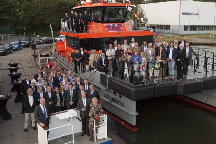Attendees pose for a photo with OWS’ new Damen FCS 2008 vessel, Offshore Waddenzee, during the christening ceremony at Damen Oranjewerf Amsterdam, on August 22 (Photo: Damen)