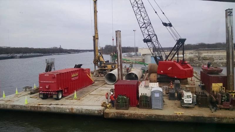 Byrne & Jones Construction built barge dolphins along the Des Plaines River for Exxon Corp. in its first marine division project after acquiring Peoria, Ill.-based Midwest Foundations. (Photo: Byrne & Jones Construction)