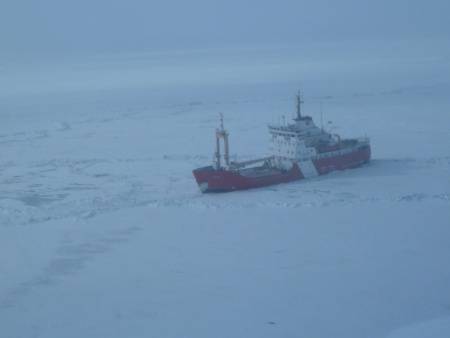 The Canadian Coast Guard Ship Griffon, a 234-foot multi-mission medium icebreaker, breaks ice in Lake Erie en route to a rendezvous with the U.S. Coast Guard Cutter Bristol Bay. The Griffon will assist the Bristol Bay into Cleveland Harbor before making way to assist the motor vessel Arthur M. Anderson. (Photo courtesy of Canadian Coast Guard)