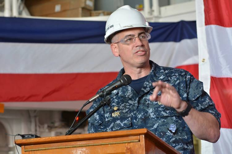 Capt. James A. Kirk, commanding officer of the future guided-missile destroyer USS Zumwalt , speaks to crew and guests in the hangar bay as part of the ship's turnover ceremony. (U.S. Navy photo by Roger S. Duncan)