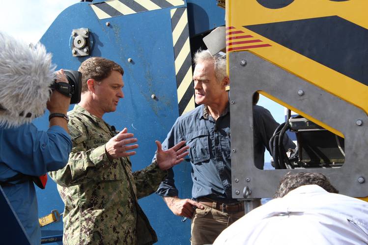 Captain Gregg W. Baumann discusses with CBS ‘60 Minutes’ anchor Scott Pelley  the technology to be deployed in the search for El Faro. The feature El Faro spot aired on CBS on Sunday, January 3, 2016.  If you missed it, view the 60 Minutes video here:http://www.cbsnews.com/videos/lost-in-the-bermuda-triangle  (Courtesy of U.S. Navy/CBS ‘60 Minutes’)