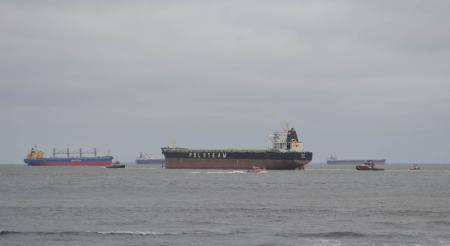 A bulk carrier ship was refloated Friday morning after running aground near Virginia Beach. (USCG photo)