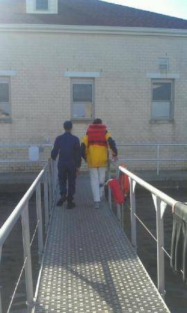 Coast Guard crew members moor a 47-foot Motor Life Boat at the station's pier. (U.S. Coast Guard photo by Senior Chief Petty Officer Jeremy McConnell)