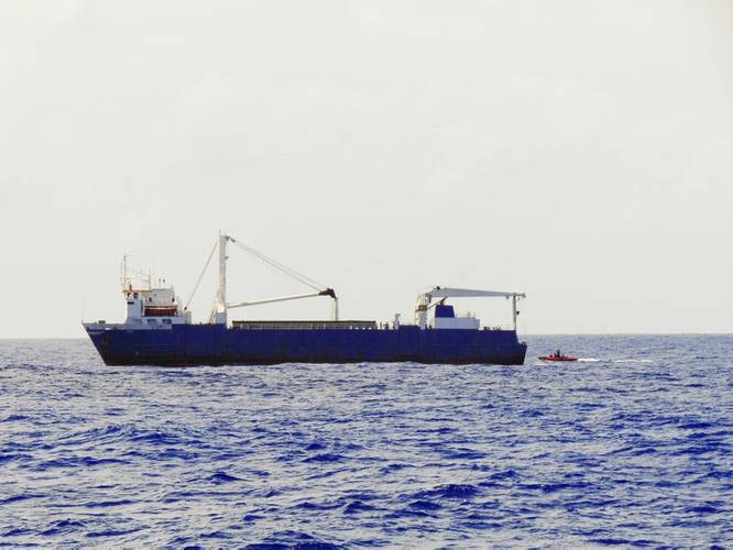 The Coast Guard Cutter Confidence's small boat crew arrives to the Alta to rescue the crew of the disabled cargo ship in the Atlantic Ocean, October 7. (U.S. Coast Guard photo by Christopher Domitrovich)