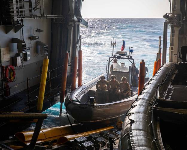Coast Guardsmen serving in Law Enforcement Detachments often operate from boats from their host vessel.  Here LEDET 408 are operating from the littoral combat ship USS Billings (LCS 15) in support of Joint Interagency Task Force South counter-illicit drug trafficking missions in the Caribbean and Eastern Pacific.
U.S. Navy photo by Mass Communication Specialist 3rd Class Aaron Lau