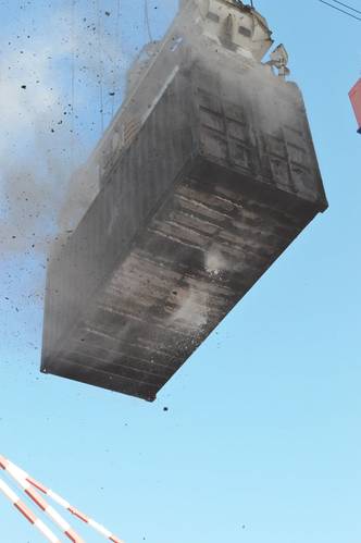 Fire damage to the floor of a container as seen during discharge.