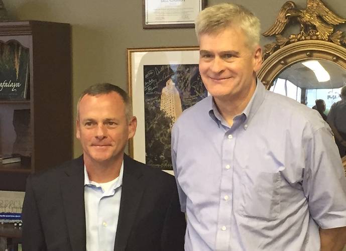 DSC Dredge President / CEO Bob Wetta (left) stands with Senator Bill Cassidy from Louisiana on September 1, 2016. (Photo: DSC Dredge)