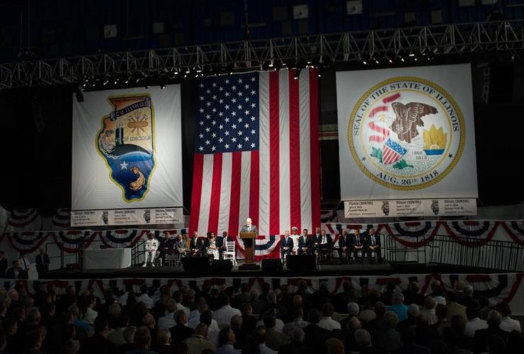 Electric Boat president Jeff Geiger welcomes First Lady Michelle Obama and guests to the submarine Illinois keel laying on June 2, 2014. (Photo: General Dynamics Electric Boat)