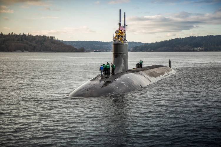 FILE PHOTO - BREMERTON, Wash. (Dec. 15, 2016) The Seawolf-class fast-attack submarine USS Connecticut (SSN 22) departs Puget Sound Naval Shipyard for sea trials following a maintenance availability. (U.S. Navy photo by Thiep Van Nguyen II)