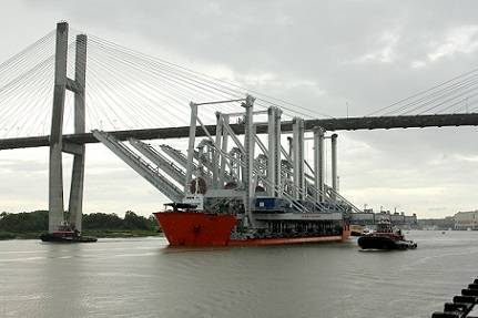 Four new super post-Panamax ship-to-shore cranes navigate the Savannah River channel on their way to the Port of Savannah’s Garden City Terminal on Wednesday, June 5. (Russ Bryant/Georgia Ports Authority)