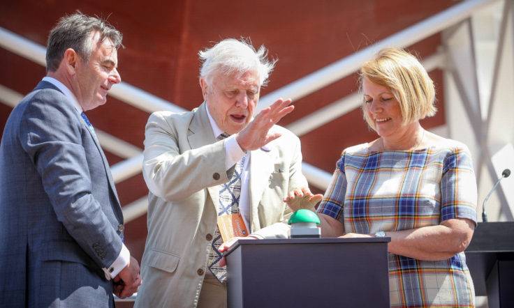From left to right: Cammel Laird Chief Executive John Syvret watches Sir David Attenborough and BAS Director Prof Dame Jane Francis push the launch button. (Photo: Simon Williams-Tully)