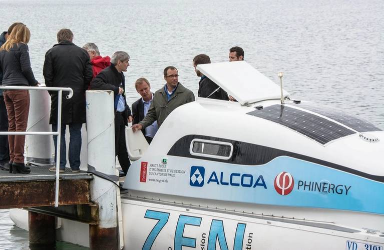 Guests embarking the aluminum-air battery equipped electric vessel. The three people in the middle, from left to right: Dekel Tzidon, CTO Phinergy; Simon Baker, President Alcoa Europe; and Martin Briere, President Alcoa GPP Canada, Europe and Africa