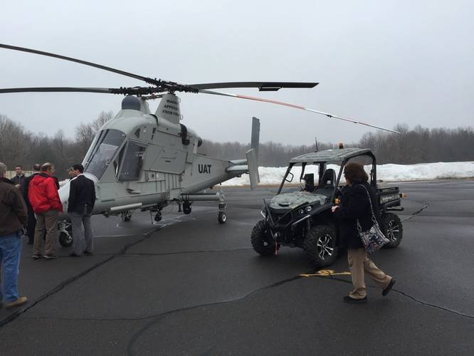 The K-MAX helicopter, seen here with the unmanned UxInterceptor vehicle, can be operated in the manned or unmanned mode, and can lift 6,000 lbs. (Neya Systems photo)